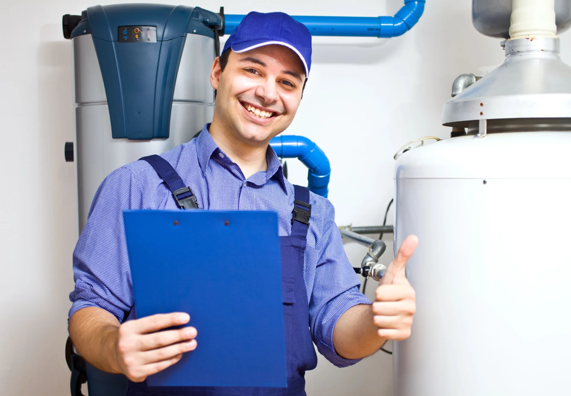 Licensed plumber installing water heater in Markham